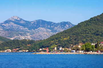 Fototapeta na wymiar Beautiful summer Mediterranean landscape. Montenegro. View of Bay of Kotor and Seljanovo village near Tivat city