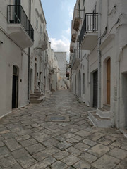 Fototapeta na wymiar Narrow streets in the old town in Italy.