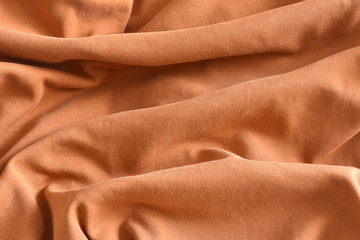 orange striped fabric as background