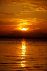 The sun goes downhill on the horizon