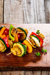 Grilled shashliks with chicken on cutting board