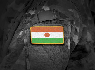 Flag of Niger on military uniforms (collage). Army,soldiers, Africa (collage).