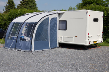 caravan at a camping site all set out. 