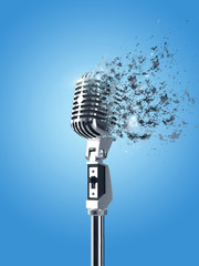 Retro microphone isolated in blue background with explodation effect