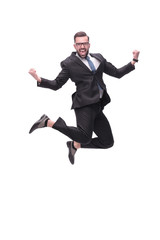 in full growth. happy dancing young businessman