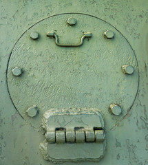Old rusty green metal door