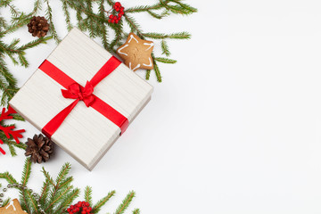 Christmas composition. Christmas gift, pine cones, christmas tree branches