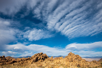 cloud patterns over rock formations Sierra Nevada Alabama Hills