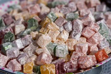 Sweets marmalade, turkish delight, bright multi-colored confectionery, close up. Background candied colorful fruit