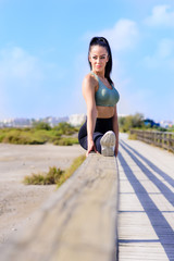 sport and lifestyle concept - woman doing sports outdoors