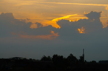 Beautiful sunset over the field. Evening landscape.