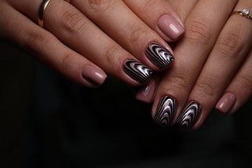 beautiful manicure of nails on the background of a fashionable