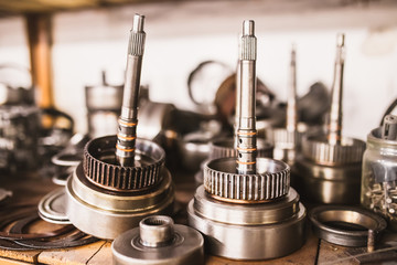 Details of an automatic transmission on a workshop table - auto repair shop