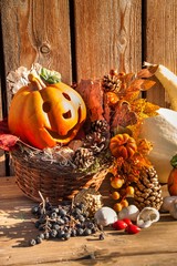 Scary pumpkin. Halloween background decorated holidays festive concept. Jack o lantern pumpkin halloween decorations. Autumn morning on the terrace.
