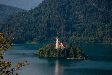 Famous Pilgrimage Church of the Assumption of Maria on an islang in the middle of the Bled Lake,...