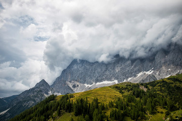 Obraz na płótnie Canvas Dramatic clouds over the Dachstein mountains, Alps in Austria