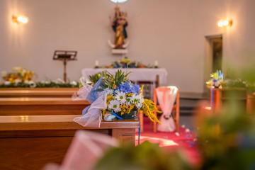 Flowers and other wedding decoration in a church