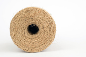 Rough texture natural jute tie. Twine string in bobbin