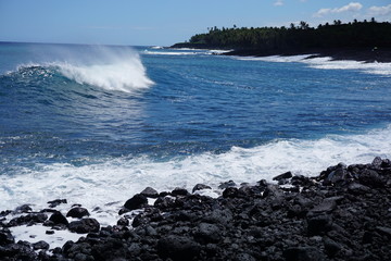 One of the newest beaches in the world - new black sand at Pohoiki Beach in Isaac Hale Park in Hawaii was created after the 2018 eruptions of Kilauea Volcano.