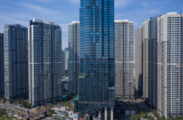 Fototapeta na wymiar ultra modern high density, high rise apartment buildings in beautiful clear sunny light