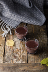 Hot chocolate and woolen blanket, cozy autumn