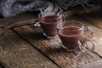 Hot chocolate and woolen blanket, cozy autumn