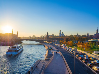 Beautiful view of Moscow from Zaryadye landscape park viewing bridge with the Kremlin in the background on a sunny autumn evening.