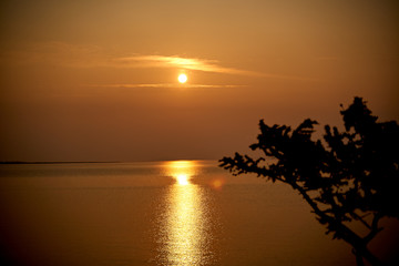 Fototapeta na wymiar Sunrise about lake Baikal in the summer