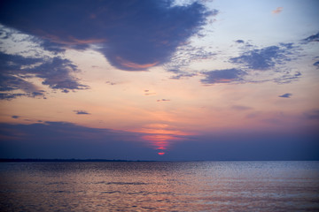 Sunrise about lake Baikal in the summer