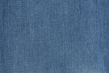 Denim texture. Navy jeans background. Closeup