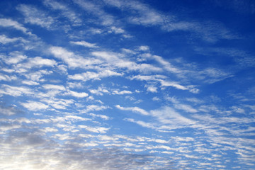 Spindrift clouds in the blue sky. Beautiful cloudscape for background