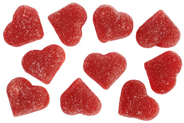 Several different sugared red jelly hearts isolated on white