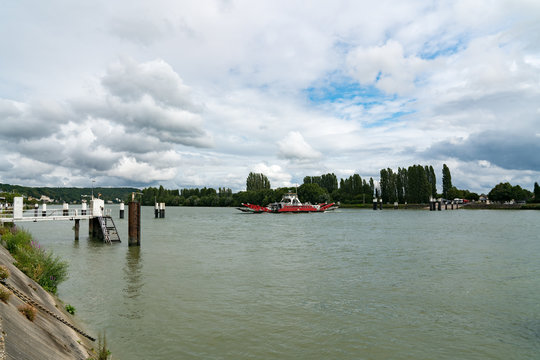 car and truck ferry crossing the Seine River in Duclair in Upper Normandy