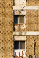 old window in brick wall, neglected old building