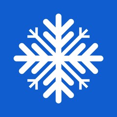 white snowflake on blue background