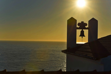 Sunset Silhouetted Church Steeple