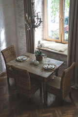 Table setting with tableware and white orchid
