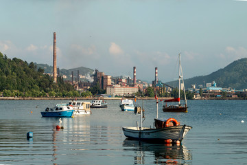 Zonguldak eregli district, fishing boats and erdemir iron and steel factory behind