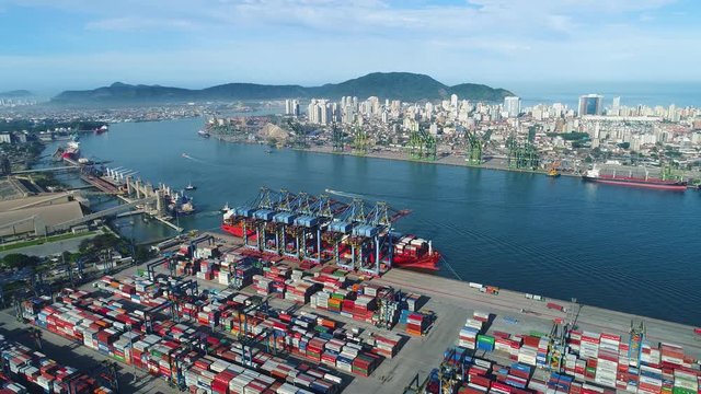  Drone aerial shot of Port in Santos Brazil and container ship in import export and business logistic  