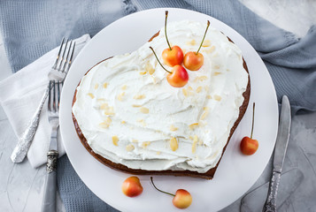 Delicious heart shaped vanilla and cream Three milk cake