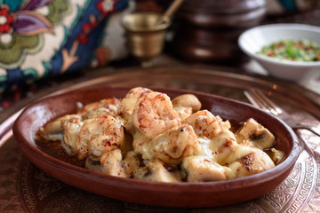 Turkish Casserole Karides Guvec, Shrimp and Mushroom Stew Baked in Clay Dish