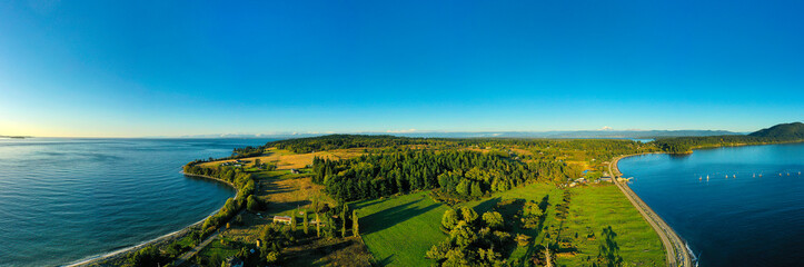 Fototapeta premium Aerial Panorama of Lummi Island, Washington. Located in the Puget Sound, Lummi Island is surrounded by the Salish Sea and is home to the famous Willows Inn and the last remaining reefnet salmon fleet.