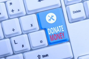 Conceptual hand writing showing Donate Money. Concept meaning to give money or goods to help a...