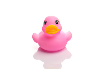 Rubber duck. Yellow plastic toy for bathroom. Ducky background