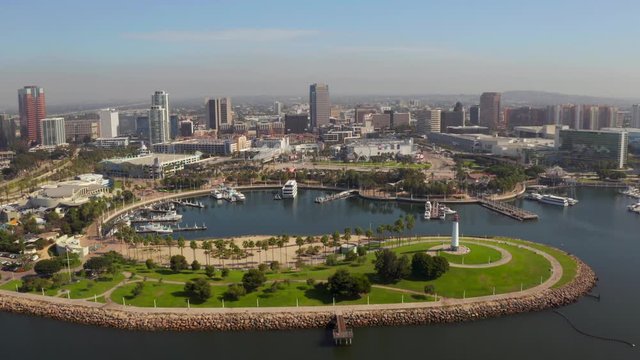 Beautiful aerial view around mothers beach at Long Beach in Los Angeles, USA. Flying over the yachts near Queen Mary ship.