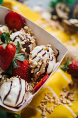 turkish loam. turkish bite dessert with chocolate and white chocolate sauce. strawberry and banana new generation bite