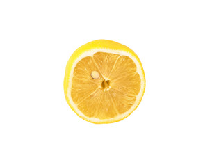 Sliced ​​half of a juicy lemon with a bone. Nutritious citrus fruit with Vitamin C.