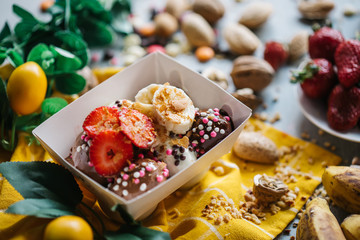 turkish loam. turkish bite dessert with chocolate and white chocolate sauce. strawberry and banana new generation bite