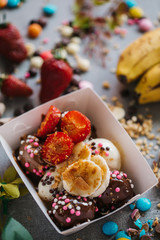 turkish loam. turkish bite dessert with chocolate and white chocolate sauce. strawberry and banana new generation bite