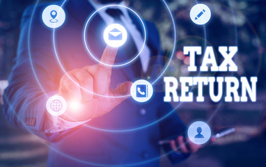 Writing note showing Tax Return. Business concept for which taxpayer makes annual statement of income circumstances